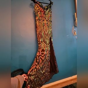 Brand New.  Full length, iridescent sequin, mermaid gown with front slit.